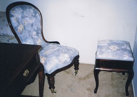 old armchair with cushion seat repaired